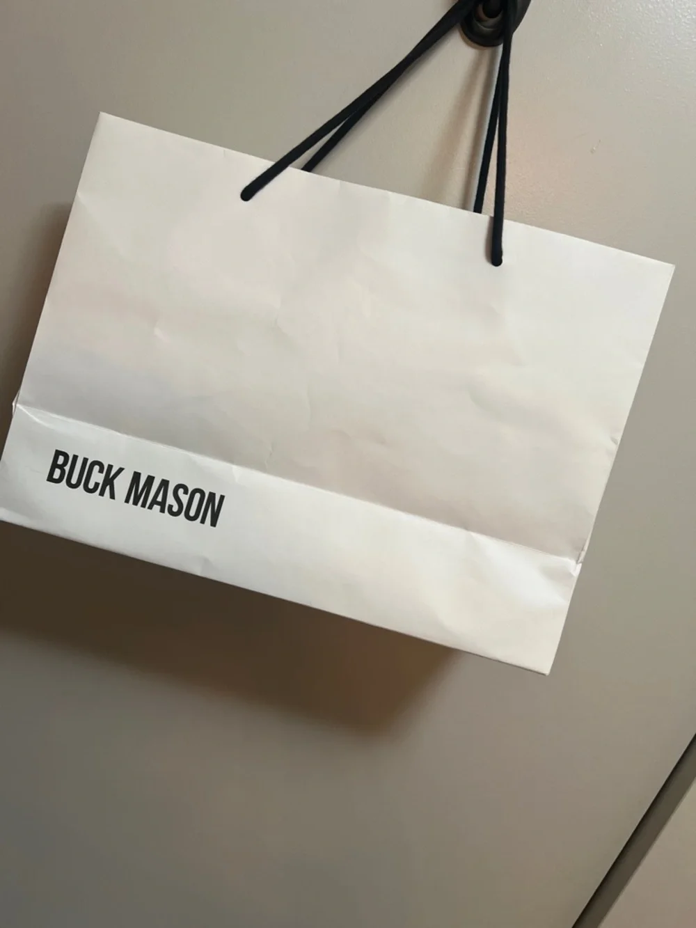 Buck Mason White Paper Tote Bag with Black Handles